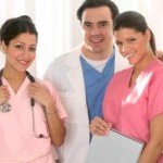 Smiling Nurses in scrubs